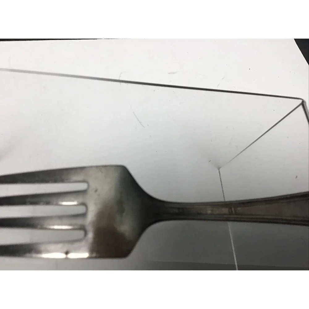 Vintage W.M. Rogers silver plate baby fork and spoon set.